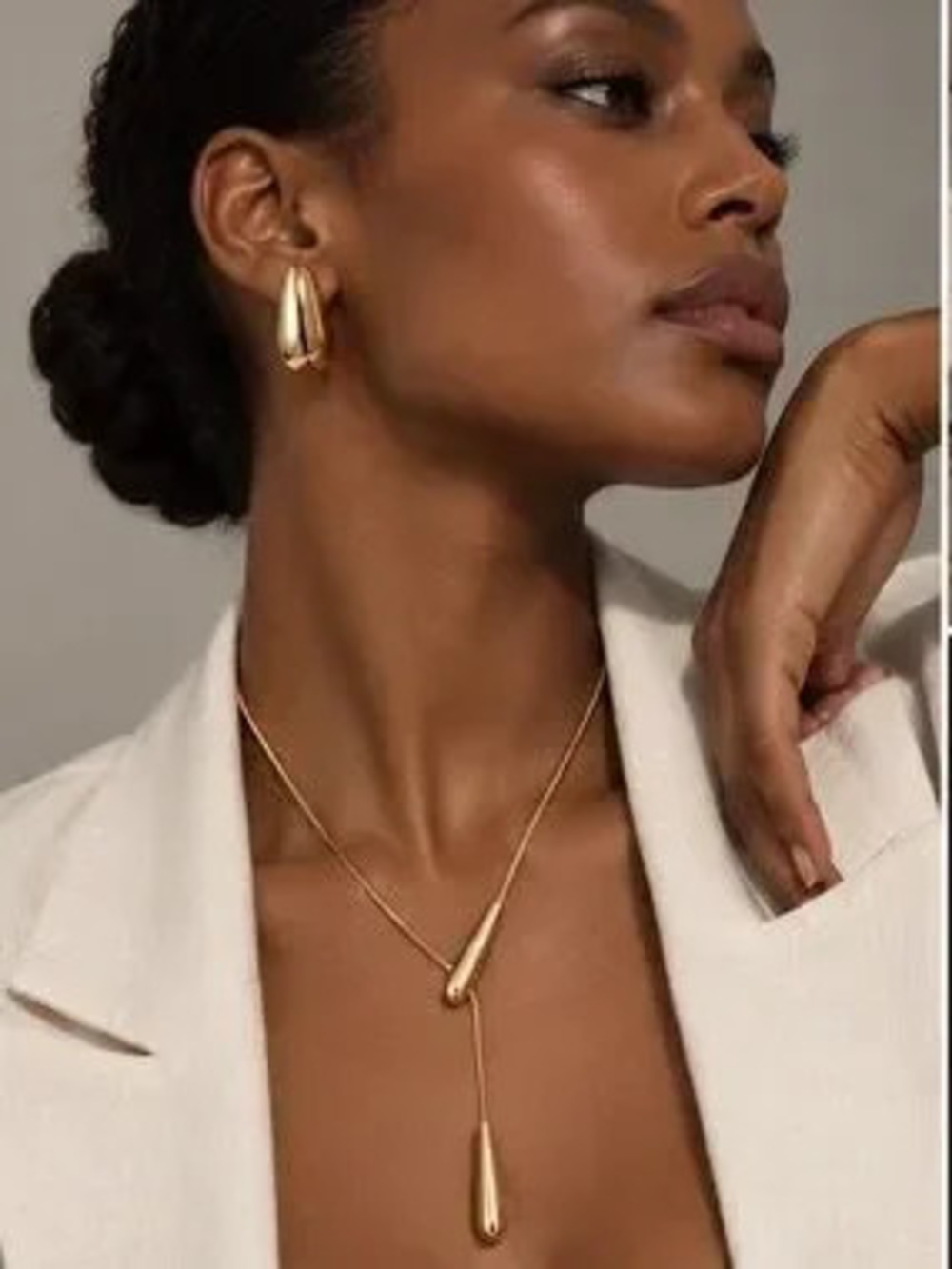 Golden Silhouette Lariat Necklace